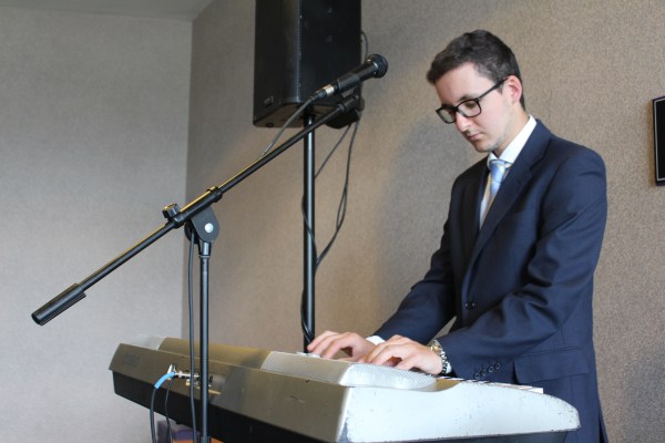 Pedro, at the keyboard at the VIP screening of Tempting Fate, Houston, July 2014.