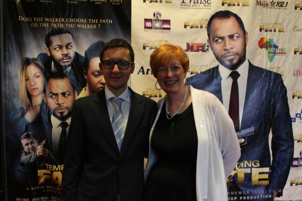 On the red carpet at the Tempting Fate premiere, July 4, 2014, Houston, TX.